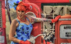 Kirsty Burrows winning pose for "Miss Pin Up"