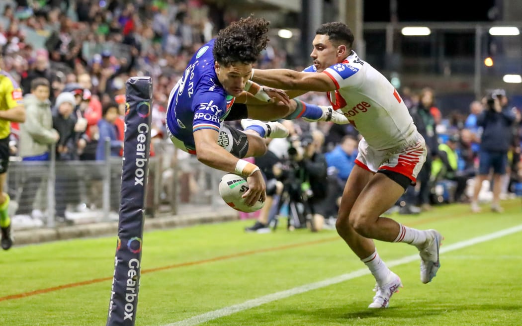 Dallin Watene-Zelezniak dives in for his third try against the St George-Illawarra Dragons.