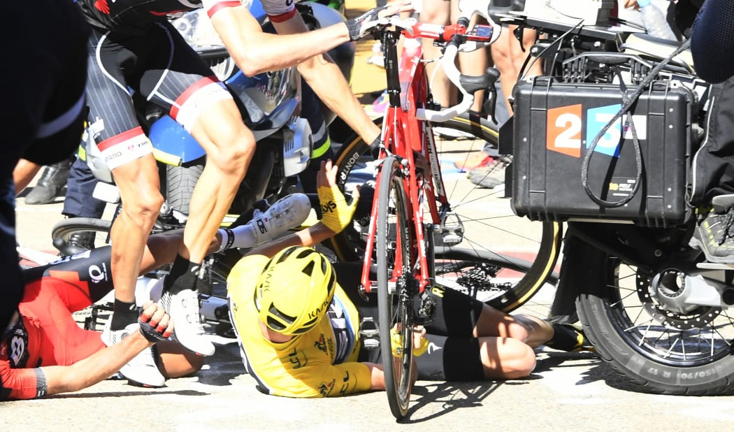 DutchMAN Bauke Mollema of Trek-Segafredo and Britain's Chris Froome of Team Sky pictured during a crash on the 12th stage of the 103rd edition of the Tour de France, 162.5 km from Montpellier to Mont Ventoux, France, on Thursday 14 July 2016, BELGA PHOTO POOL BERNARD PAPON