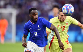 France's Arnaud Kalimuendo in action during the Paris Olympics 2024 men's football game against Spain at Parc des Princes in Paris, France. 09 August 2024. Copyright Photo: Raghavan Venugopal / www.photosport.nz
