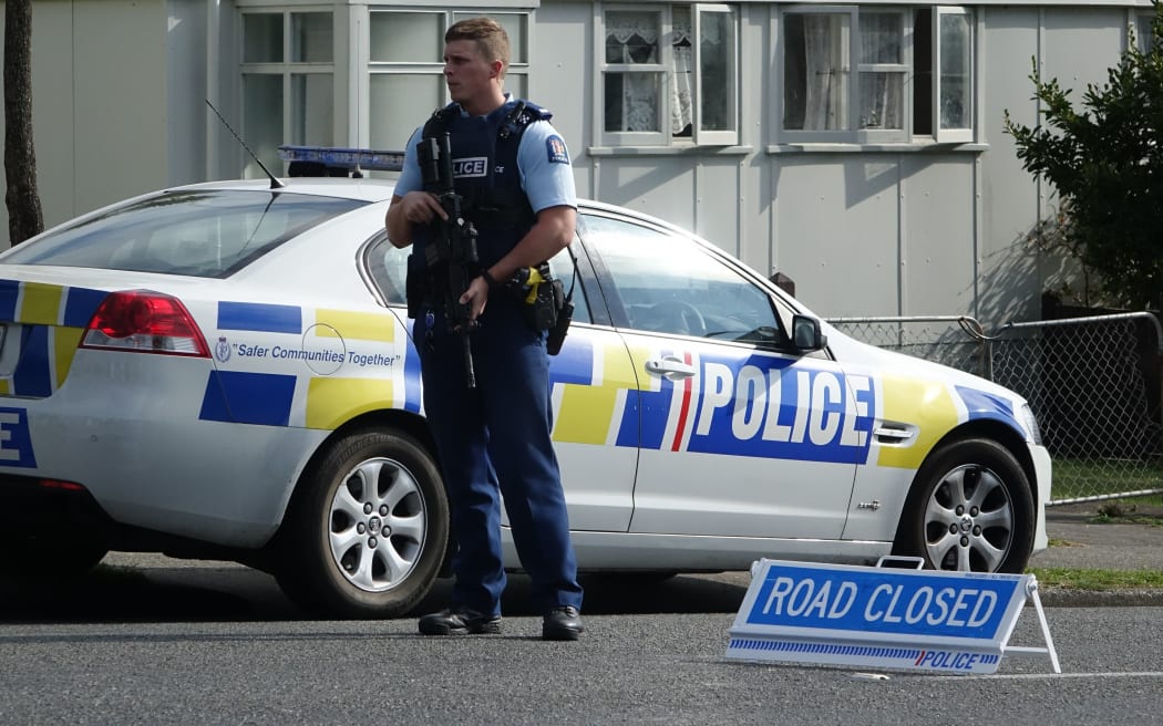 Armed officer at Warspite Ave, Porirua