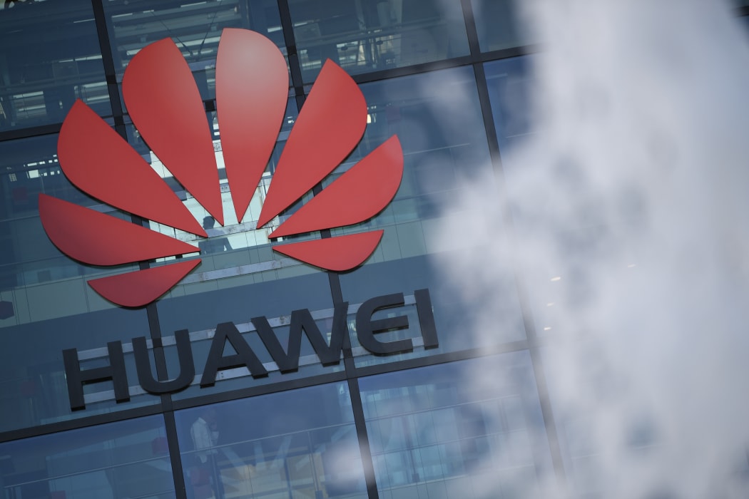 The logo of Chinese company Huawei is seen at their main UK offices in Reading, west of London.