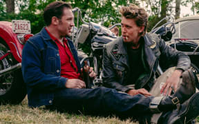 Still from the 2024 drama film The Bikeriders featuring Tom Hardy and Austin Butler