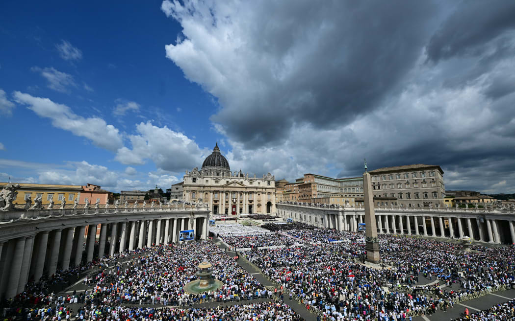 A general view shows Pope Leo XIV leading a Holy Mass for the Beginning of his Pontificate, in St Peter's square in The Vatican on May 18, 2025. (Photo by Tiziana FABI / AFP)