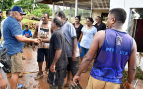 Fiji Prime Minister Frank Bainimarama visits a community in Ba which was hit by floods caused by Cyclone Josie.