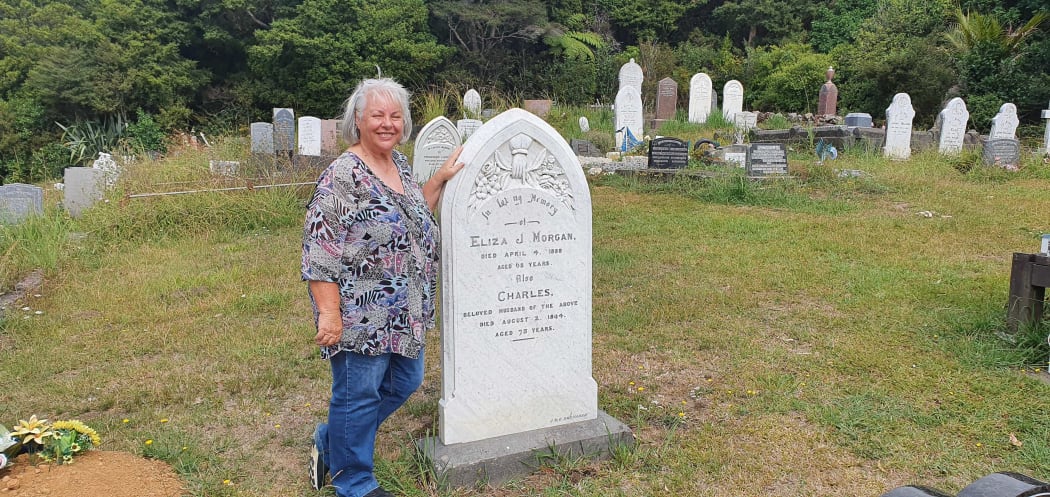 Adrienne Miller with the first headstone she cleaned.