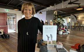 Founder of Untouched World Peri Drysdale standing next to the company's Rubbish Socks which took home the circular business innovation award.