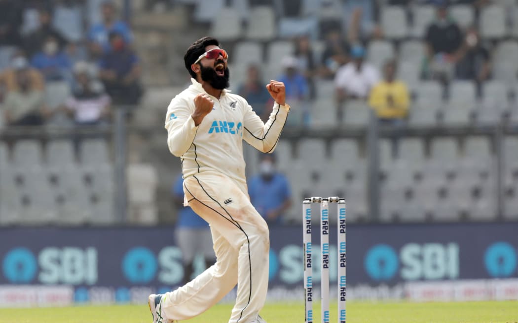 Ajaz Patel of New Zealand celebrates a wicket during the second test against India at the Wankhede Stadium in Mumbai, 2021.