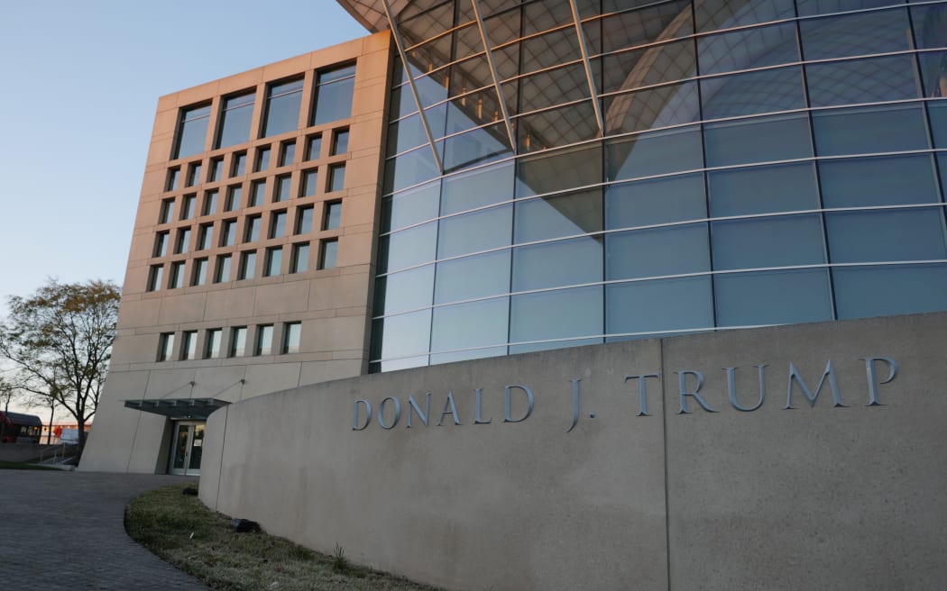 WASHINGTON, DC - DECEMBER 03: U.S. President Donald Trump's name is seen recently placed on the outside of the United States Institute of Peace (USIP) building headquarters on December 03, 2025 in Washington, DC. This addition was made ahead of the Trump administration hosting a deal-signing between the leaders of Rwanda and the Democratic Republic of Congo.   Anna Moneymaker/Getty Images/AFP (Photo by Anna Moneymaker / GETTY IMAGES NORTH AMERICA / Getty Images via AFP)