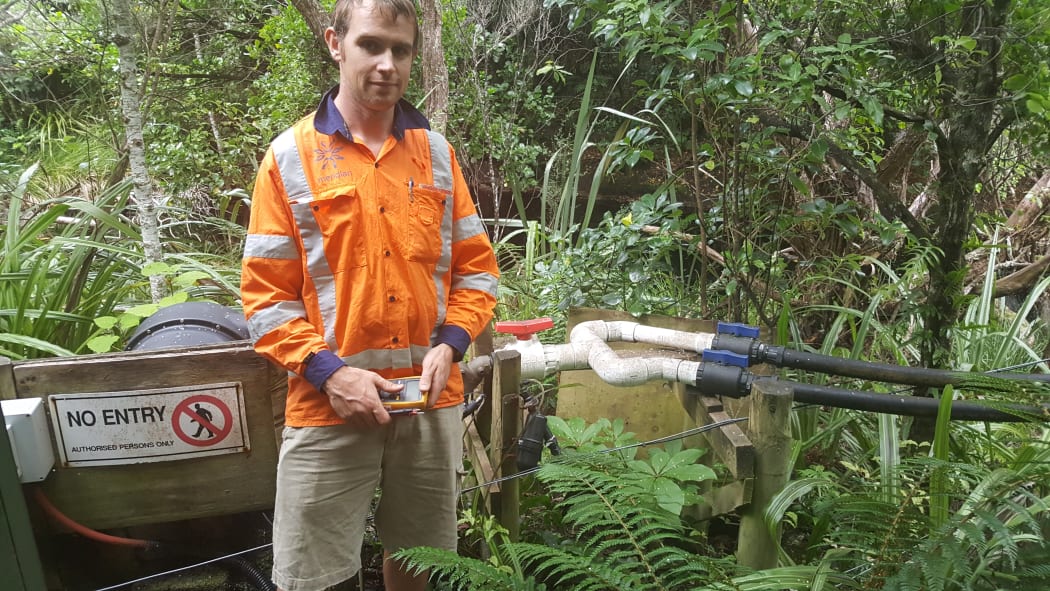 Electrician Reuben works for Kākāpō Recovery Programme sponsor Meridian Energy, but he also spends time on Whenua Hou maintaining the power system, which includes this mini hydro scheme.