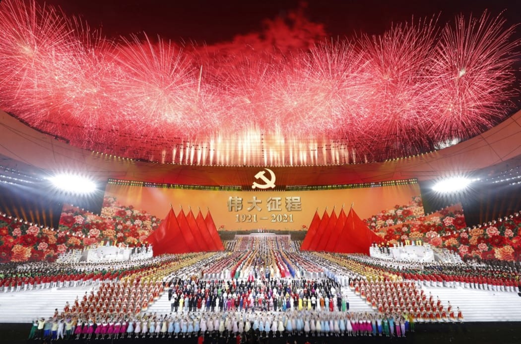 (220106) -- BEIJING, Jan. 6, 2022 (Xinhua) -- An art performance titled "The Great Journey" is held in celebration of the 100th anniversary of the founding of the Communist Party of China (CPC) at the National Stadium in Beijing, capital of China, on the evening of June 28, 2021.