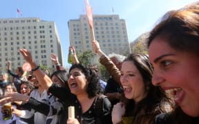 Pro-abortion activists celebrate outside the constitutional court in Santiago, Chile.