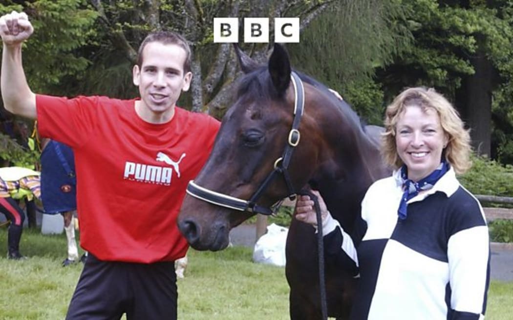 Huw Lobb winner of the Man v Horse race stands with the fastest rival horse Kaybeejay and rider Zoe White from Llandrindod Wells after the 2004 race