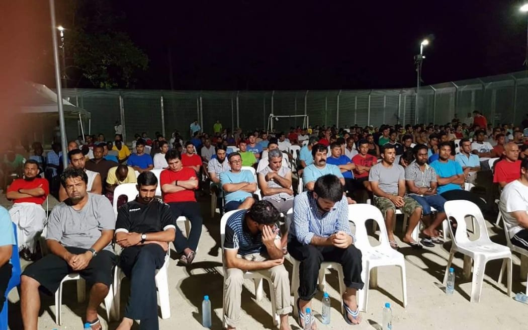 Hundreds gather for memorial service for Pakistani refugee who drowned.