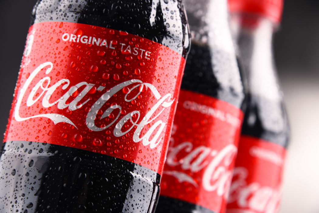POZNAN, POLAND - MAR 1, 2018: Plastic bottles of Coca-Cola, a carbonated soft drink manufactured by The Coca-Cola Company headquartered in Atlanta, Georgia, USA