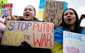 Pro-Ukraine activists protesting against the Russian invasion of the country demonstrate outside the Houses of Parliament in Parliament Square in London, England, on March 6, 2022.
