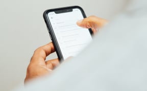 man using iPhone