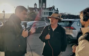 Jesse Mulligan & Gregor Campbell record on the streets of Dunedin.