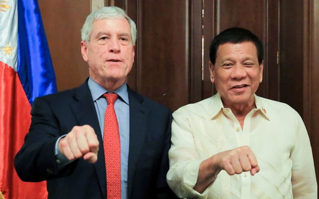 Australian Secret Intelligence Service director-general Nick Warner photographed with Philippines President Rodrigo Duterte.