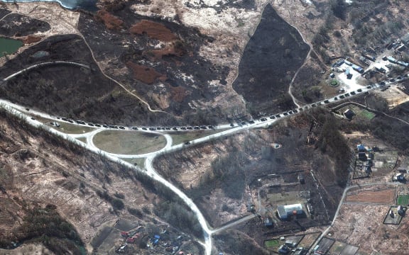 Satellite image taken by private satellite company Maxar shows that the 64-km long Russian military convoy reached outskirts of Kharkov, Ukraine, on Monday Feb 28, 2022.