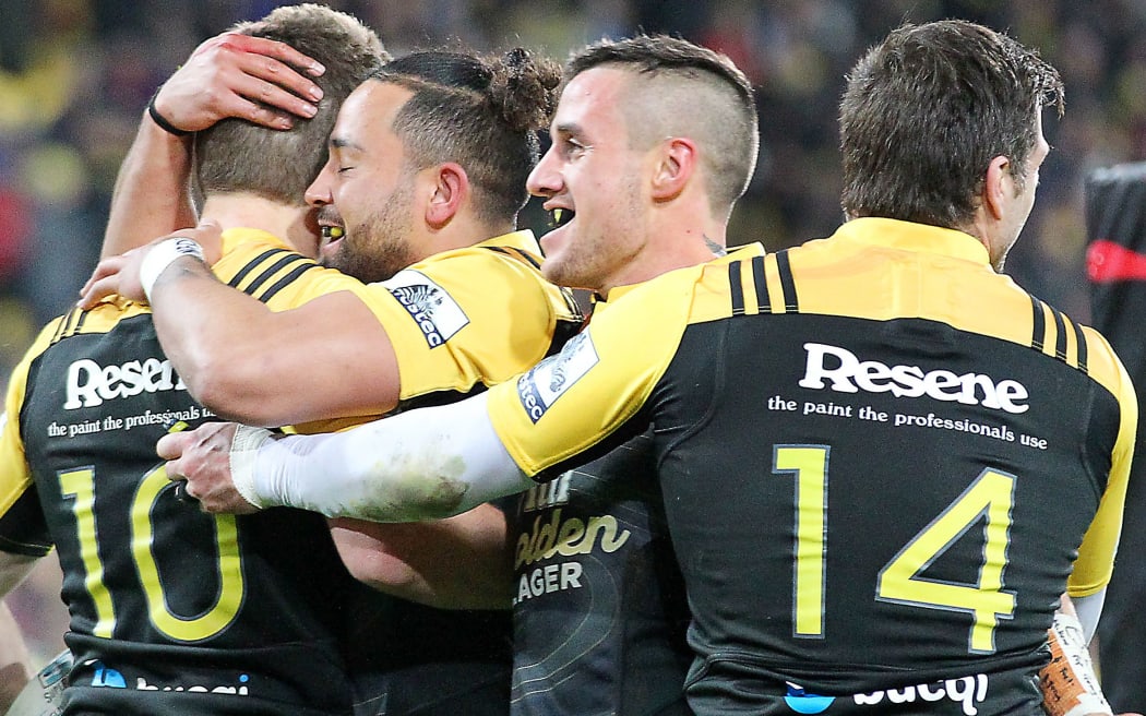 The Hurricanes embrace.