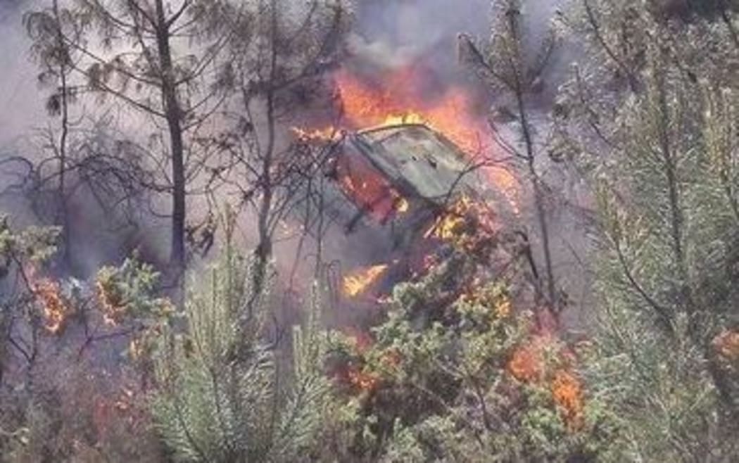 Hayden Paddon's Hyundai burns out after his crash on stage 5. Rally Portugal. 2016.
