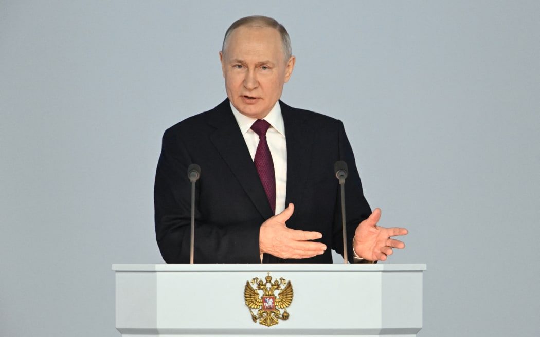 Russian President Vladimir Putin delivers his annual state of the nation address at the Gostiny Dvor conference centre in central Moscow on 21 February 2023.