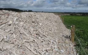 Contaminated waste used to form a track at Coutts Island.