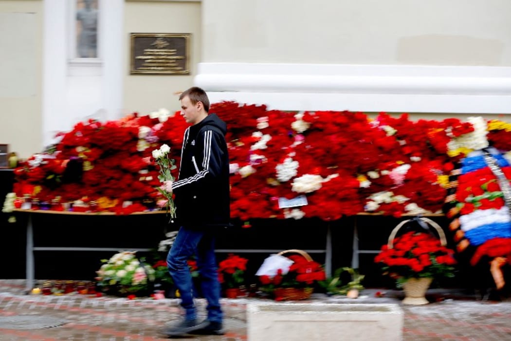 Flowers outside Alexandrov Hall, a rehearsal room of the Alexandrov Ensemble. Members of the ensemble were killed when the plane they were on came down off the Russian Coast.