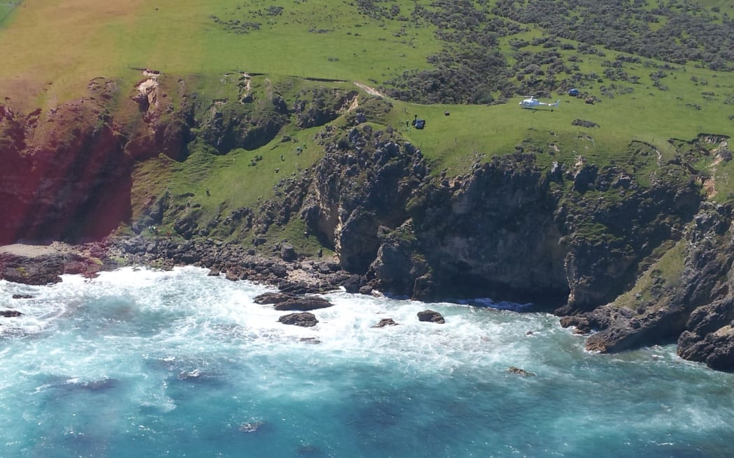 A rescue helicopter crew carried out two winch operations to retrieve two men (one with a spinal injury and one deceased) from this area.