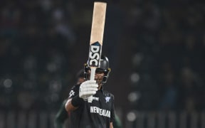 New Zealand’s Rachin Ravindra celebrates during the ICC Champions Trophy one-day international against Bangladesh , 2025.