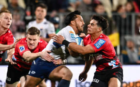 Pepesana Patafilo of Moana Pasifika is tackled by Dallas McLeod of the Crusaders and Noah Hotham of the Crusaders  during the Super Rugby Pacific match, Crusaders Vs Moana Pasifika, at the Apollo Projects Stadium, Christchurch, New Zealand, 31st May 2024. Copyright photo: John Davidson / www.photosport.nz