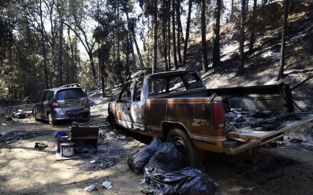 Cars were burned as Salt Fire started on June 30, 2021 and quickly grew in size and forced the evacuation of residents on Shasta Lake near Salt Creek in California, United States on 4 July 2021.
