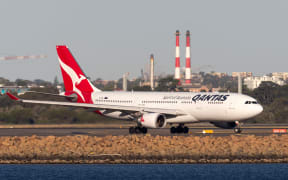 Sydney, Australia - October 9, 2013: Qantas Airbus A330 large passenger airliner on the tarmac at Sydney Airport.