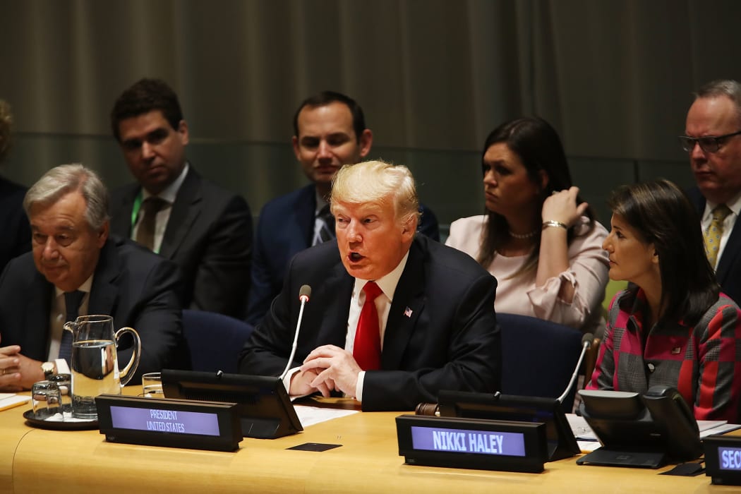 US President Donald Trump attends a meeting on the global drug problem at the United Nations (UN) with UN Ambassador Nikki Haley.