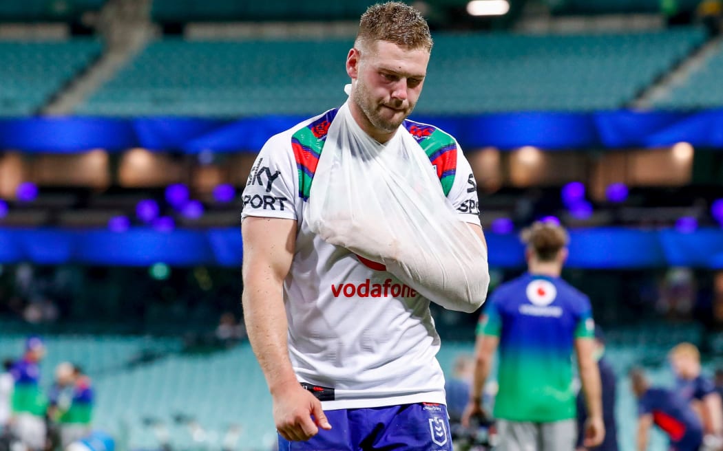 A dejected looking Bayley Sironen with his injured arm .Sydney Roosters v Vodafone Warriors. NRL Rugby League, Sydney Cricket Ground, NSW, Australia, Sunday 4th April 2021