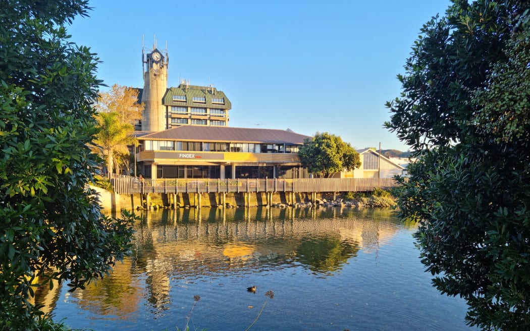The new library site on the banks of the Maitai River with Nelson City Council's Civic House behind it