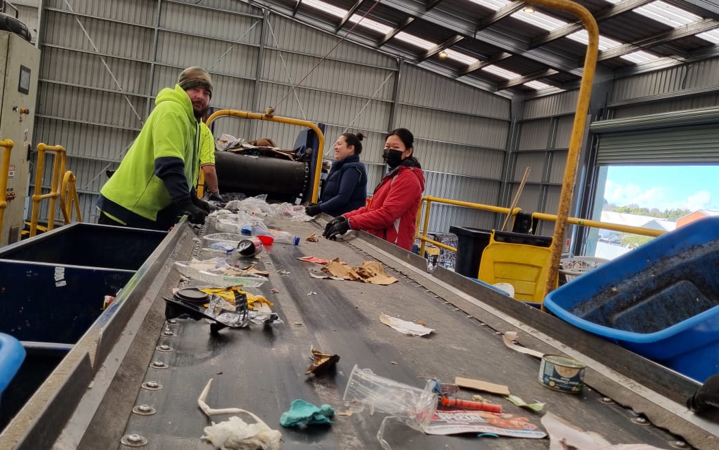 Staff sorting items on the line at the Te Awamutu recycling facility, in August 2024.