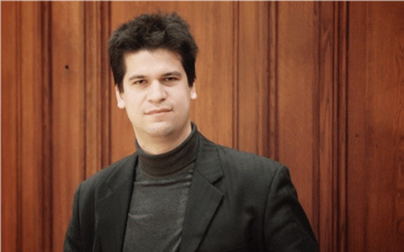 publicity shot of Hungarian composer András Gábor Virágh