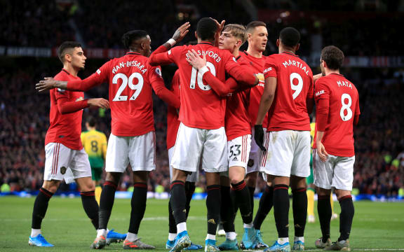 Manchester United celebrate a Marcus Rashford goal.