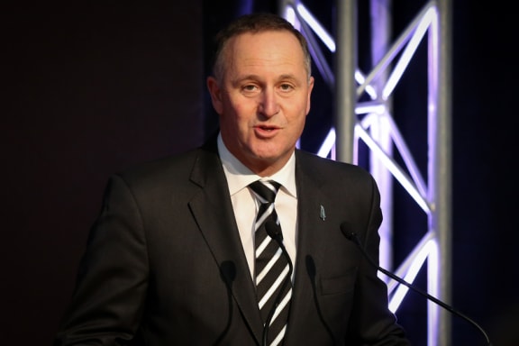John Key at the All Blacks RWC 2015 squad announcement.