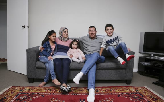 Brighter Futures project. Syrian refugee family.  Lin Youssef (8), Majed Burhan (Mother), Najwa Youssef (2), Ibrahim Youssef (Father), Ahmad Youssef (6)