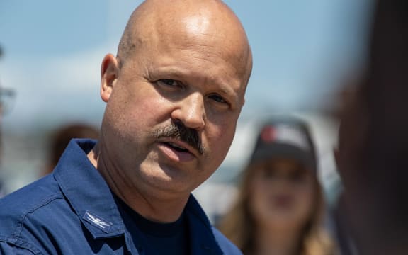 US Coast Guard (USCG) Captain Jamie Frederick speaks to reporters about the search efforts for the Titan submersible that went missing near the wreck of the Titanic, at Coast Guard Base in Boston, Massachusetts, on June 21, 2023. The USCG said Wednesday it had not identified the source of underwater noises detected by sonar in the search for the missing submersible. "We don't know what they are, to be frank with you," Frederick said regarding the sounds that had raised hopes the five people onboard are still alive. "We have to remain optimistic and hopeful when you're in a search and rescue case," he told reporters. (Photo by Joseph Prezioso / AFP)