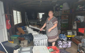 Barker Rd resident Tracey Tasovac returned home for the first time after Monday's storm to find the contents of her garage badly damaged by flood waters.