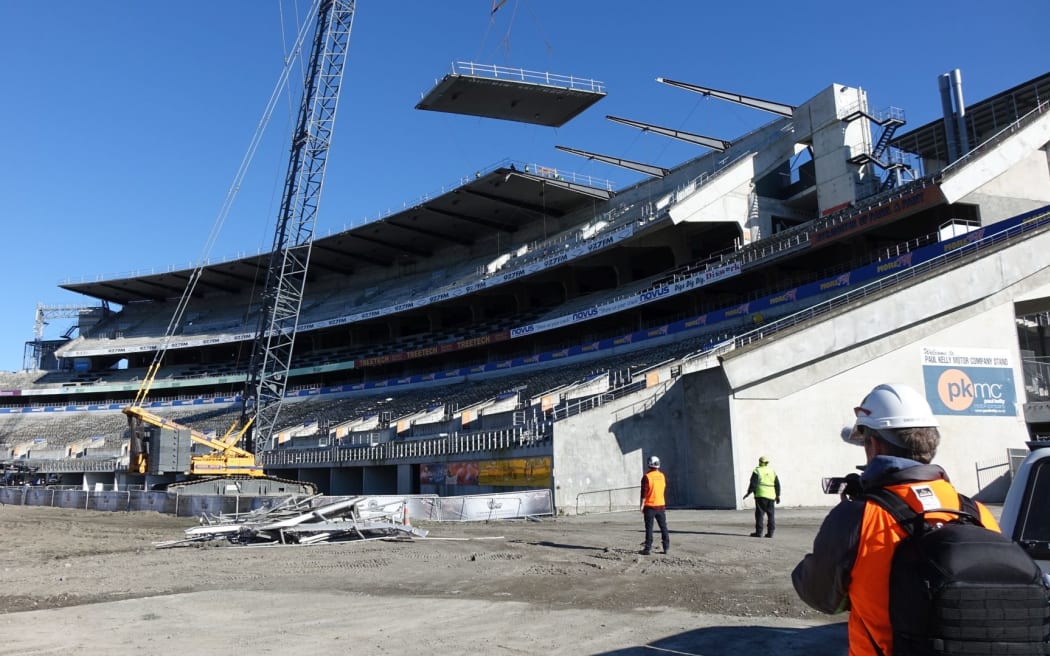 Another roof panel comes off the Paul Kelly stand at Christchurch's Lancaster Park.