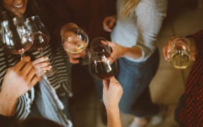 women drinking wine