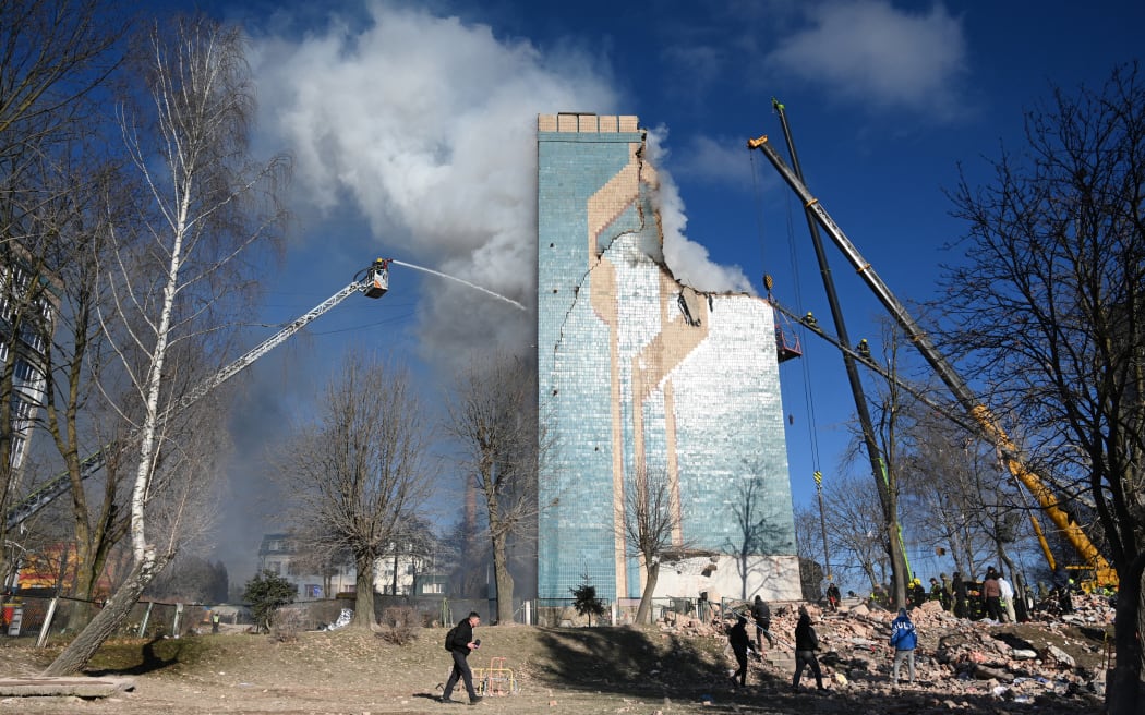 Ukrainian rescue personnel operate at the site of a heavily damaged residential building following Russian air strike in the city of Ternopil, on 19 November, 2025, amid the Russian invasion of Ukraine.
