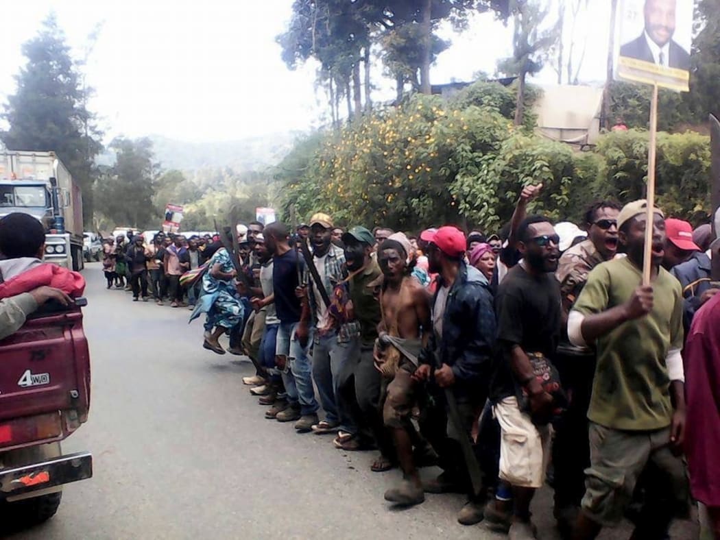 Supporters of election candidate Alfred Manase take to the streets in Wabag town, as violence erupts in Enga's provincial capital, 22 July 2017.
