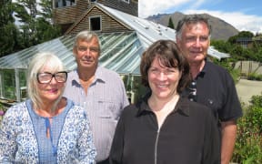 Jill and Dick Jardine with Otago University's Harlene Hayne and John Ward outside the Remarkables homestead the Jardines are donating to the university. Picture /