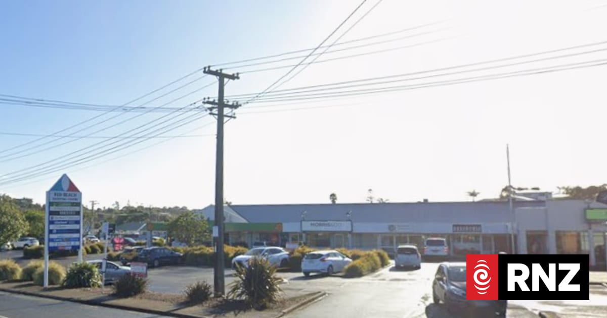 One dead after car crashes into shopping centre in Auckland
